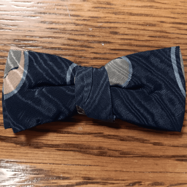 A patterned blue bow tie, said to have been worn by Abraham Lincoln the night of his death.